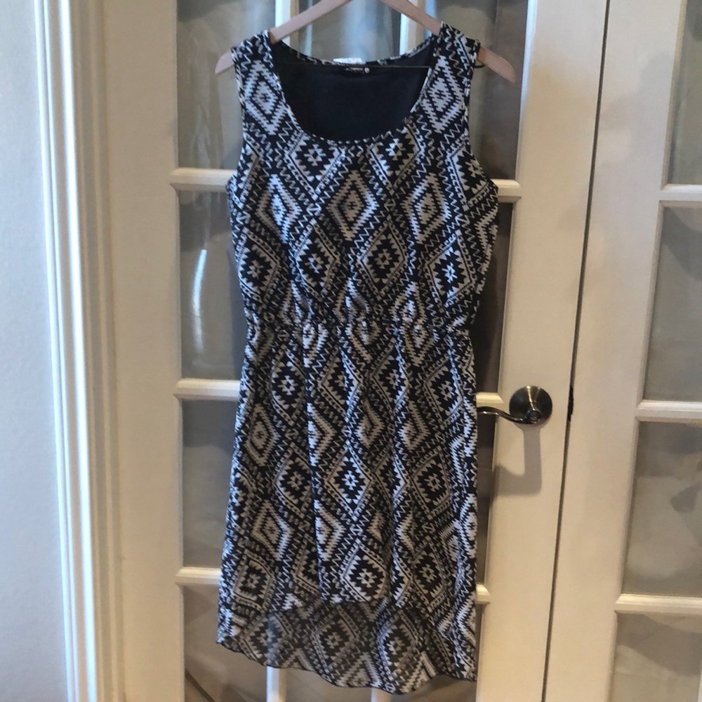 Indulge womens dress in a large. Black and white design with stretchy waist.